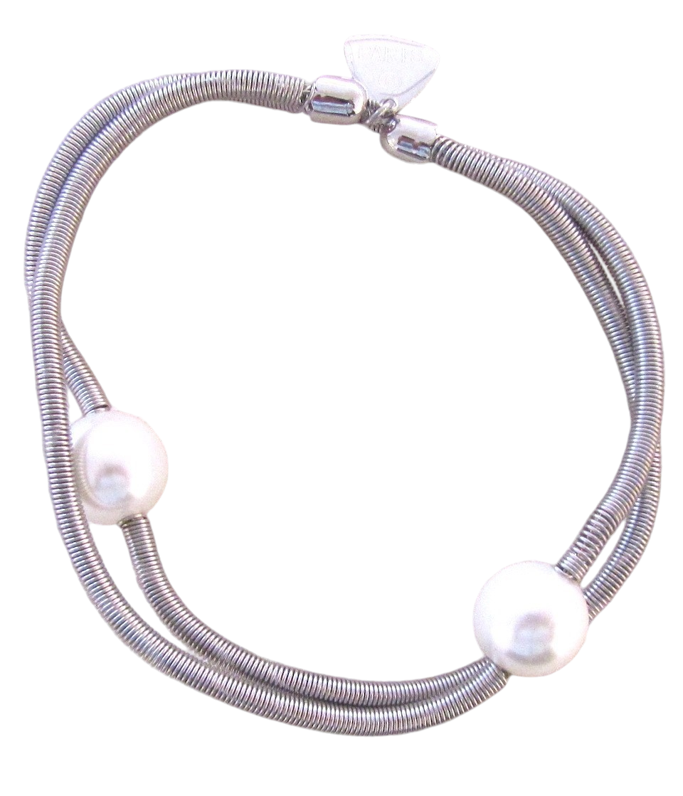 Bracelet SATELLITE FIN, no 64, de l'artiste Sandrine Giraud, Ce bijou marie avec élégance la grâce et l’originalité des lignes résolument contemporaines. longueur de 8 pouces