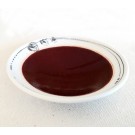 Assiette mini coupelle (dessus rouge), de l'artiste Elizabeth Hamel, medium : céramique porcelaine blanche, dessus émail cuivré, 0.75 po haut x 3.50 po diamètre 
