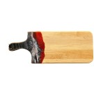 Planche à découper, rouge et noire de l'artiste Julie Marcotte, Matériaux, Érable, résine alimentaire et huile de pépin de raisin, dimension : 3/4 x 7 x 18 pouces