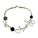 Collier ROSE DES SABLES, no 141, de l'artiste Sandrine Giraud, couleur gris argent, perles blanche et noire. Ce bijou marie avec élégance la grâce et l’originalité des lignes.