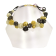 Collier ESCARGOT FLOCON, no 127, de l'artiste Sandrine Giraud, couleur, doré, gris, noir et blanc. Ce bijou marie avec élégance la grâce et l’originalité des lignes.
