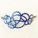 Bracelet Gribouilli (bleu, pois bleu foncé), no 38, de l'artiste Molusk, Longueur 6.5 pouces, Bijou d'inspiration aquatique souple et léger fait de PVC coloré qui épouse la forme du corps à la manière d’un tatouage, vue 2