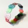 Bracelet Perles (multi bleu, rose, rouge, noir, blanc), no 27, de l'artiste Molusk, Longueur 6.0 pouces, Bijou d'inspiration aquatique souple et léger fait de PVC coloré qui épouse la forme du corps à la manière d’un tatouage, vue 2