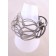 Bracelet TWIST argent, no 66, de l'artiste Sandrine Giraud, Ce bijou marie avec élégance la grâce et l’originalité des lignes résolument contemporaines. 