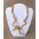 Collier BOA COMPRESSÉ, no 4, de l'artiste Sandrine Giraud, Ce bijou modulable, toujours original, marie avec élégance la grâce des perles avec l’originalité des lignes résolument contemporaines.