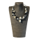 Collier ESCARGOT FLOCON, no 174, de l'artiste Sandrine Giraud, couleur, argent, gris et noir. Ce bijou toujours original, marie avec élégance la grâce et l’originalité des lignes.