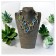 Collier RC-CERTI, no 189, de l'artiste Sandrine Giraud, couleur, argent, perles bleues, vertes, jaunes. Ce bijou modulable, toujours original, marie avec élégance la grâce et l’originalité des lignes. contexte