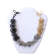 Collier ESCARGOT, no 8, de l'artiste Sandrine Giraud, Ce bijou marie avec élégance l’originalité des lignes résolument contemporaines.