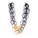 Collier TWIST DOUBLE, no 20, de l'artiste Sandrine Giraud, Ce bijou marie avec élégance l’originalité des lignes résolument contemporaines.
