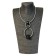 Collier RESSORT DOUBLE ANNEAUX, no 128, de l'artiste Sandrine Giraud, couleur gris argent, noir. Ce bijou marie avec élégance la grâce avec l’originalité des lignes.