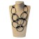 Collier SAUTOIR RESSORT CUBIQUE, no 114, de l'artiste Sandrine Giraud, couleur, argent, cubes noirs. Ce bijou modulable, toujours original, marie avec élégance la grâce et l’originalité des lignes.